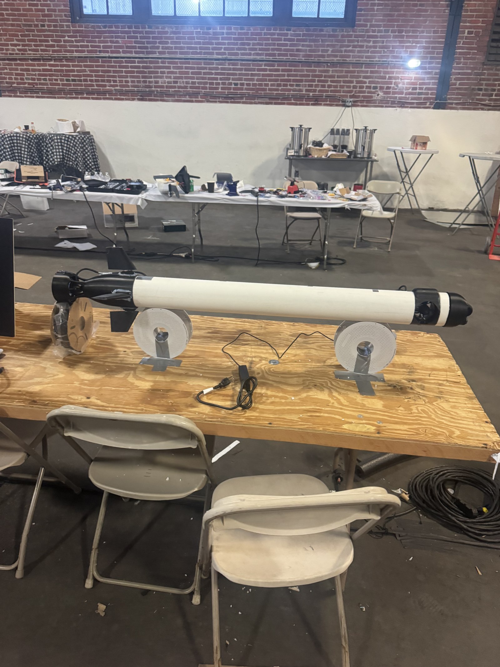 The assembled vehicle resting on stands on a workbench