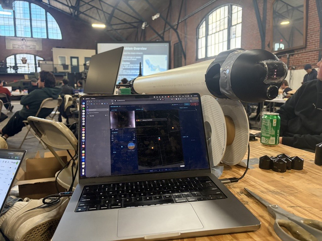 Laptop running the Navigator C2 interface next to the vehicle during testing
