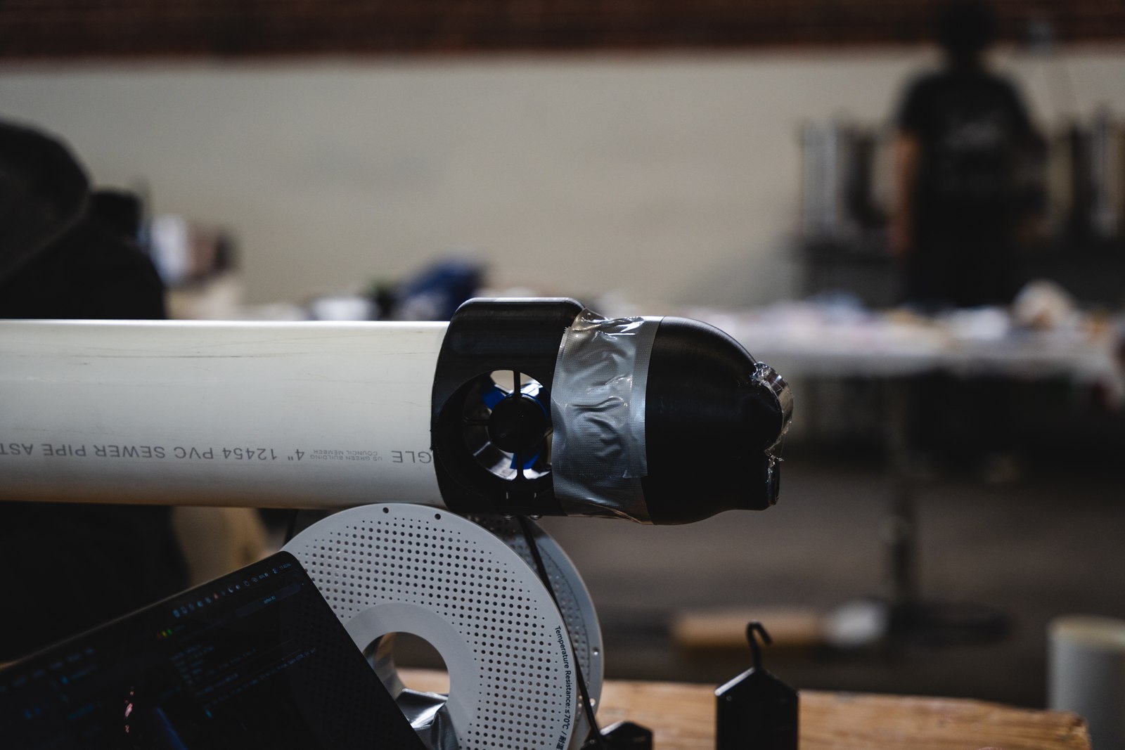 Close photo of the as-built rear thruster on the PVC hull